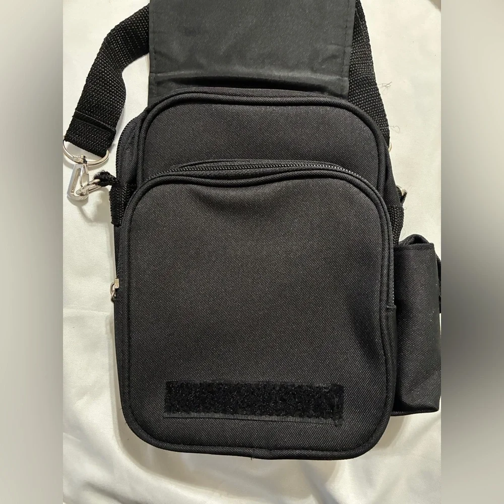Petit Crossbody with Paris Bling. 3 Zippered pockets. 32” + detachable strap